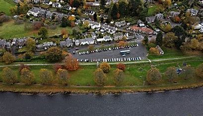 An aerial view of the riverside car park and river edge